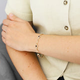 7" Oval Garnet Bracelet | Pre-Loved | 9K Yellow Gold